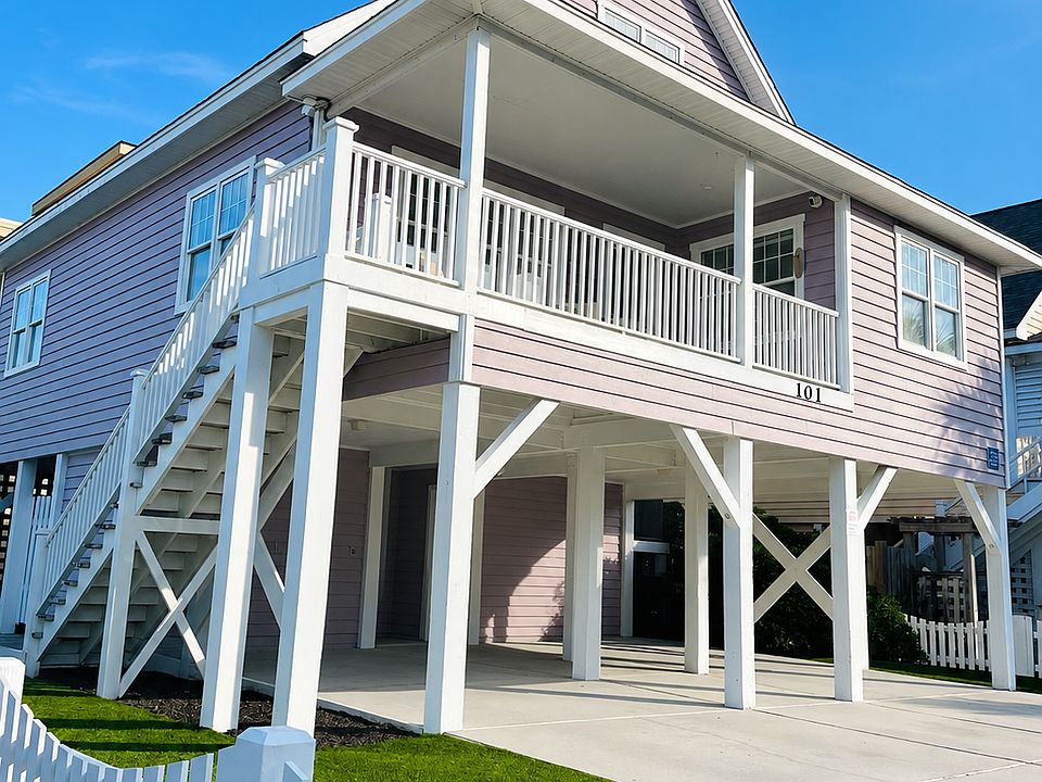 Front of House with 5 parking spots