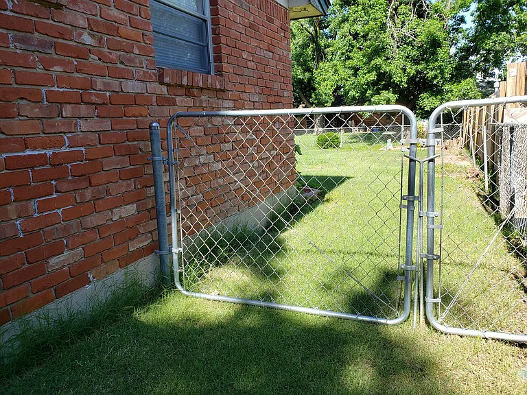 If needed for riding mower, etc. there is large gate access to backyard.
