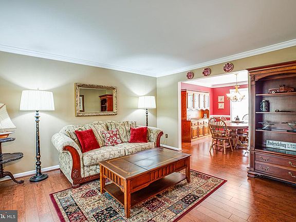 View of living room with a peak into the dining rm