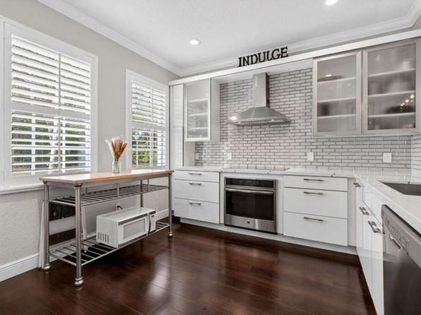 203 E Thatch Palm Cir