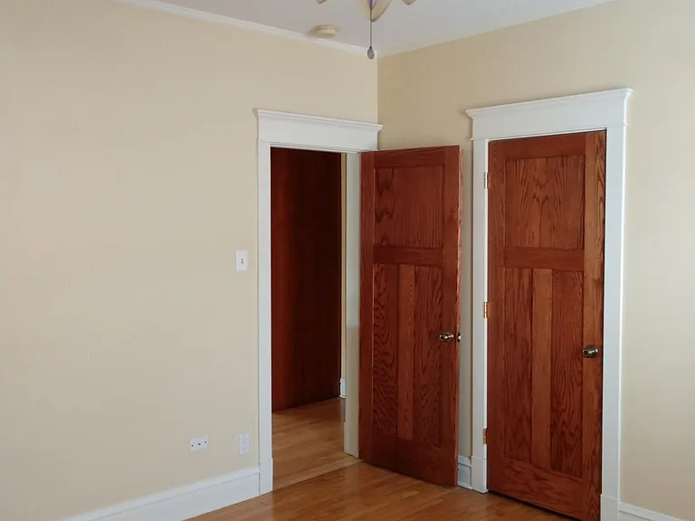 Master bedroom with walk-in closet and 2 large windows.