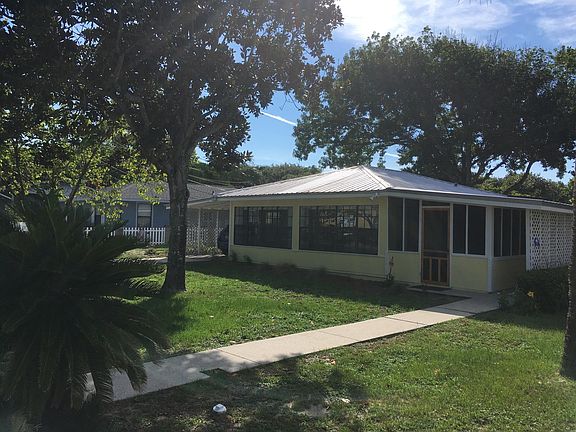 Front Exterior. Carport on left side of house.