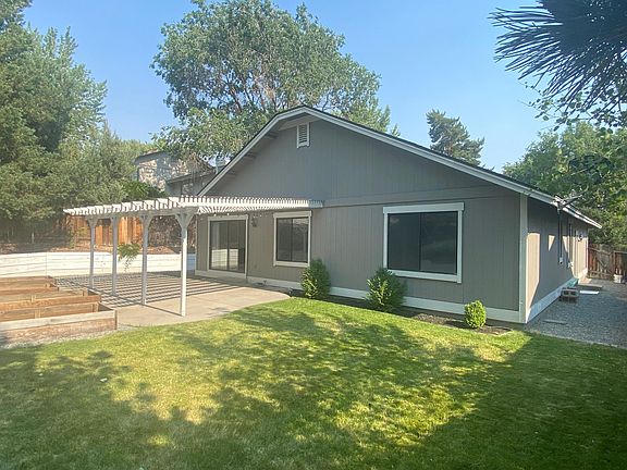 Back View of House / Patio Area / Flower-Veggie Beds