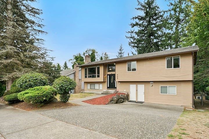 Front of the house - Access to the upper unit is black door up the stairs