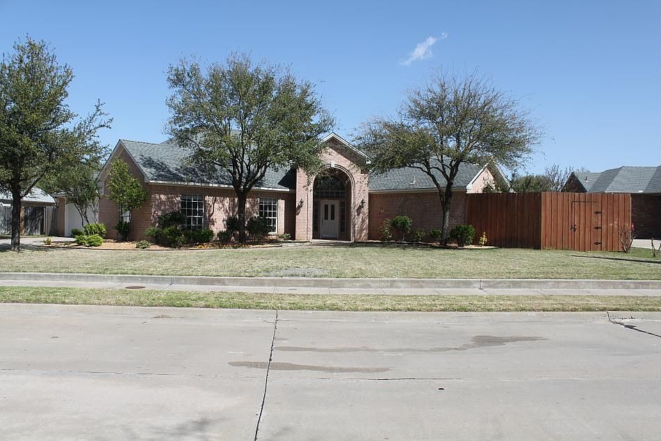 Great Curb Appeal with Large Front Yard and Nice Landscaping