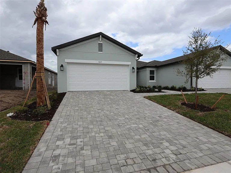 9117 Optimist Way — Photo 1