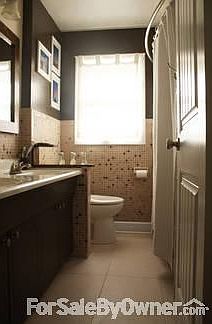 Main Bath - double sinks, tub/shower combination and large linen closet