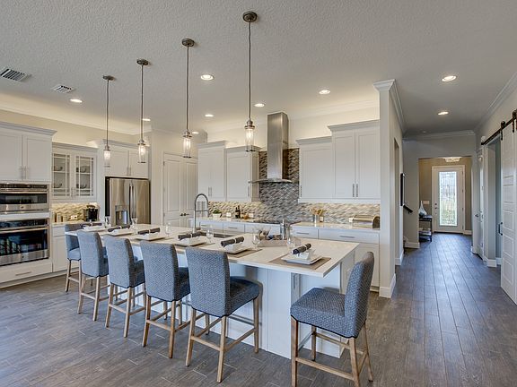 Sleek kitchen with huge island