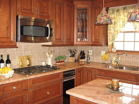 Updated w/cherry cabinets and granite counters