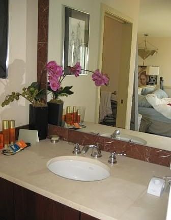updated master with limestone and marble, deep soaking tub