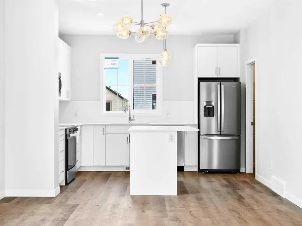 40 W Creekside Way SW #104, Calgary, AB T2X 4A9