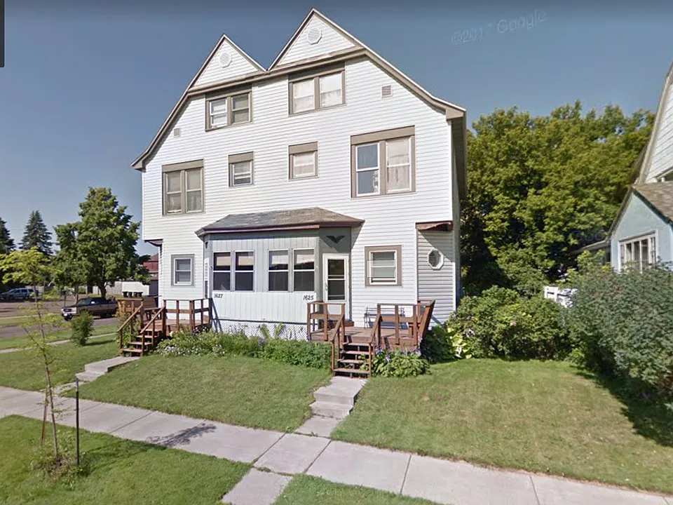 This huge apartment is the top two floors of this building.