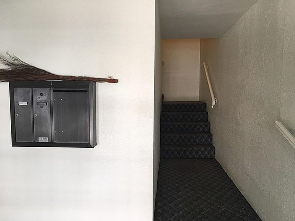 Up the stairs of the front entrance