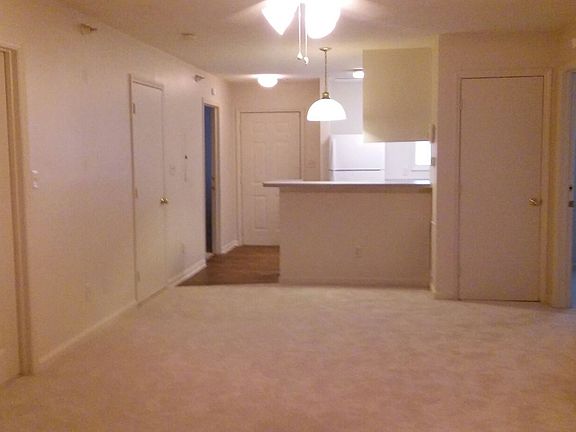Living room looking into kitchen