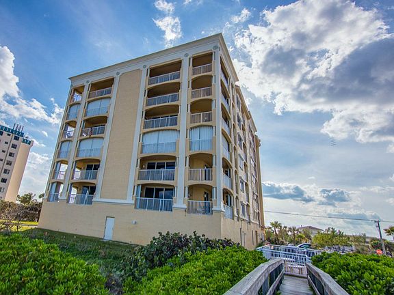 Building View From Boardwalk to Beach