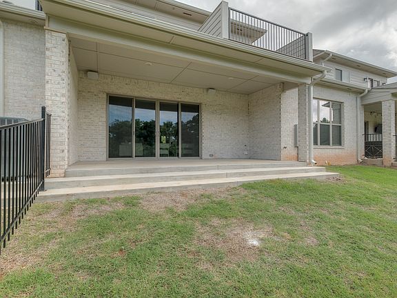 Back Patio and Upstairs Balcony