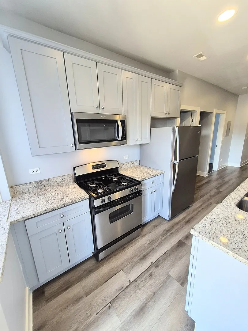 Building Photo - 6210 S Eberhart Ave #1N