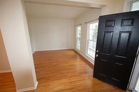 Large windows brighten the formal dining room.