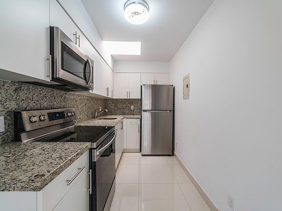 fully remodeled kitchen with stainless steel appliances 