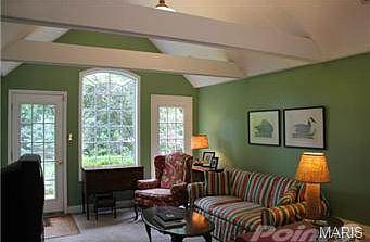 Vaulted Family Room, which walks out to the backyard.