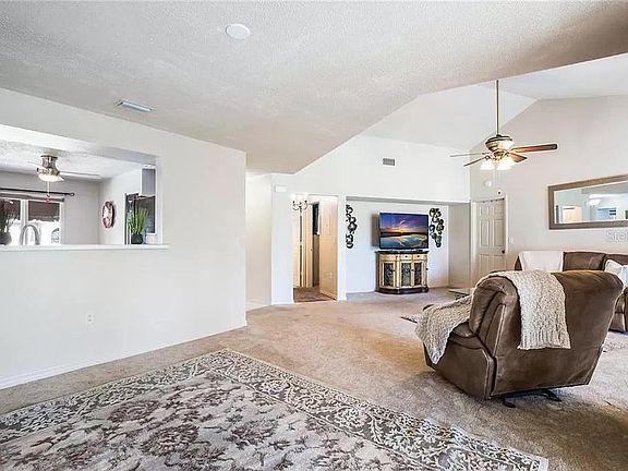 Living room with vaulted ceiling