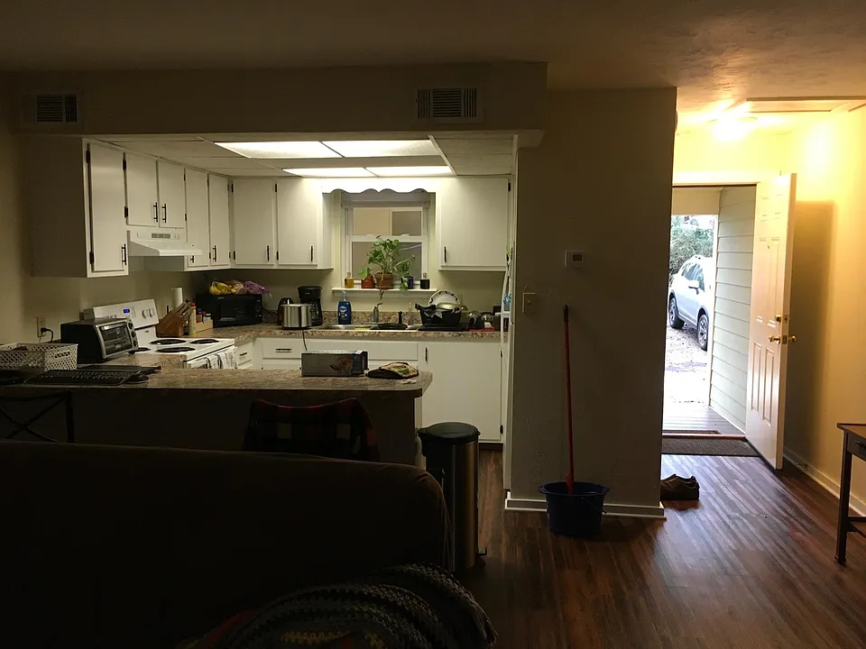 Front door entryway and kitchen view