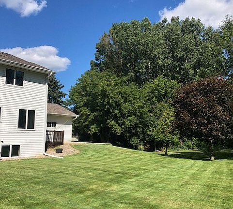 Large private backyard with deck