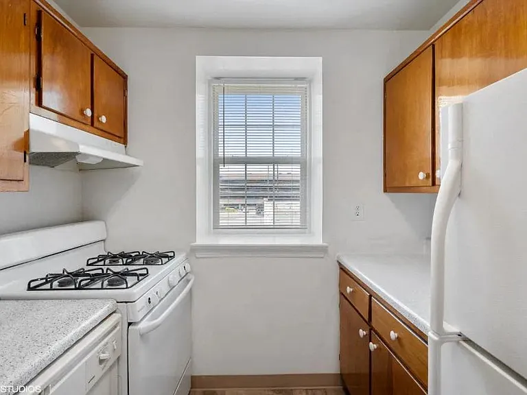 Bright kitchen with white appliances