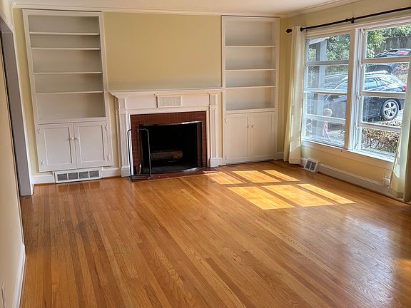 Built-in bookshelves and fireplace in living room