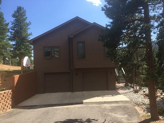 Wide driveway and entry area