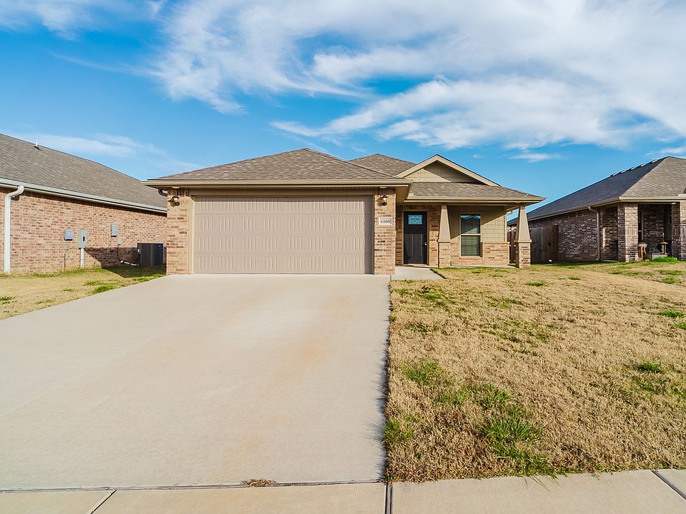 Front View with Driveway