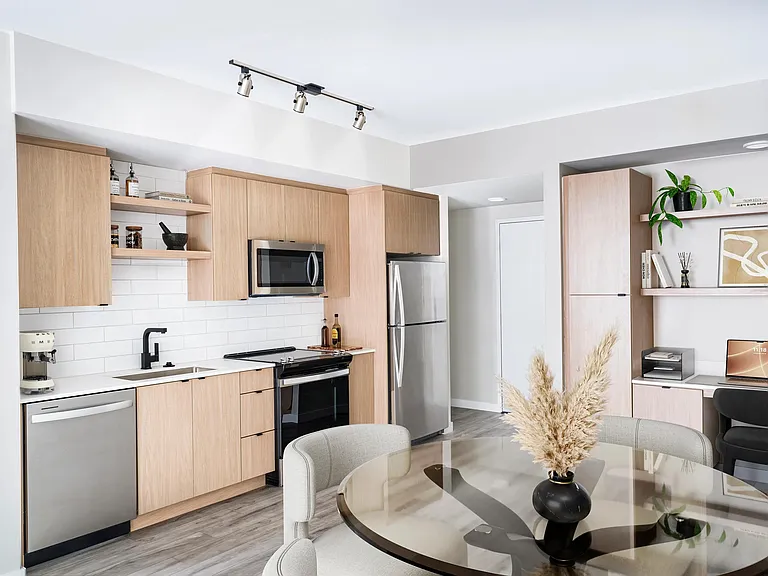 A built-in desk nook in this new home within our North Tower offers the perfect spot to work from home_stylish, functional, and seamlessly integrated.