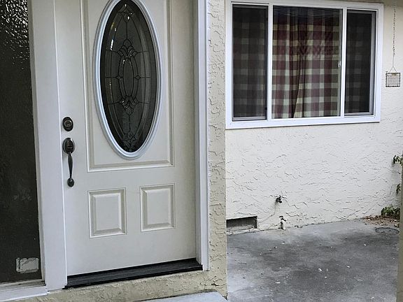 Front door with small private patio