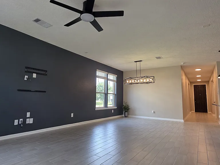 Open concept living, dining and kitchen.