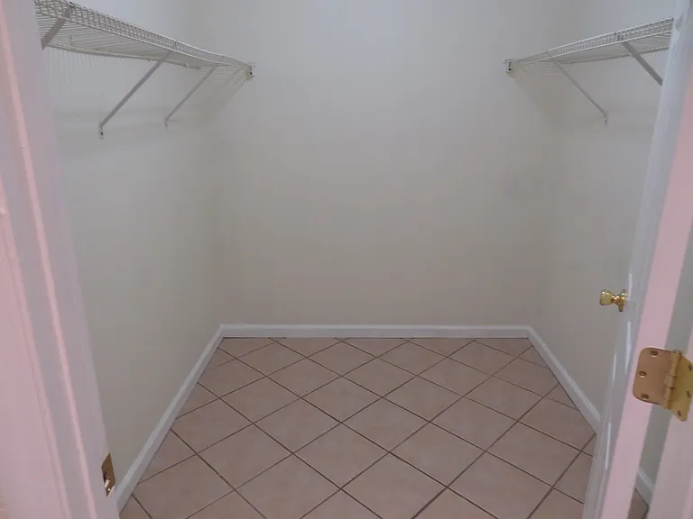 Large Walk-in Closet and Separate Double Closet in Master