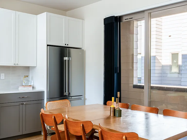 East facing balcony next to kitchen with morning natural light