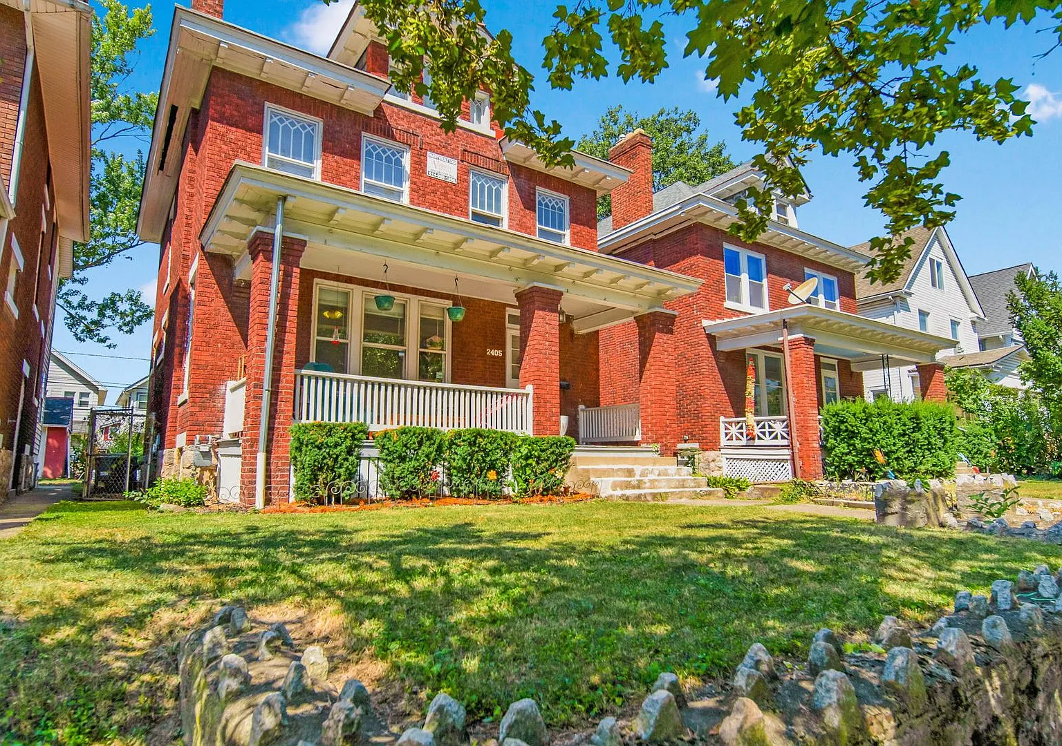 Charming 5-Bedroom Home with Exposed Brick and Modern Upgrades — Photo 1
