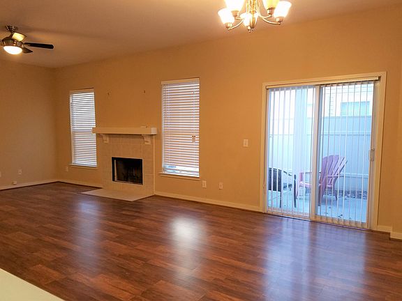 Living and Dining room open to the kitchen and back patio area.