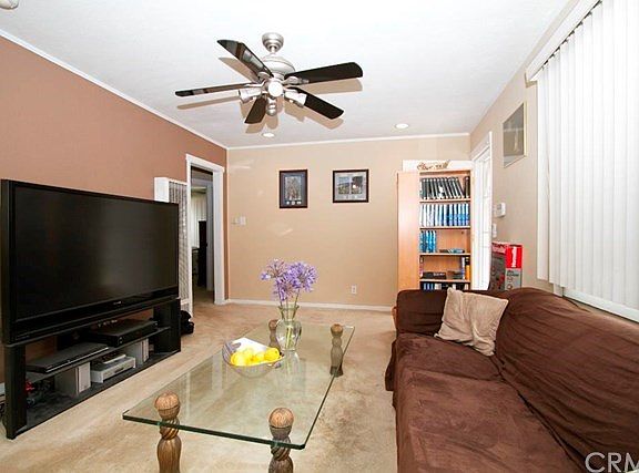 Family Room with recessed lighting & new wall heater