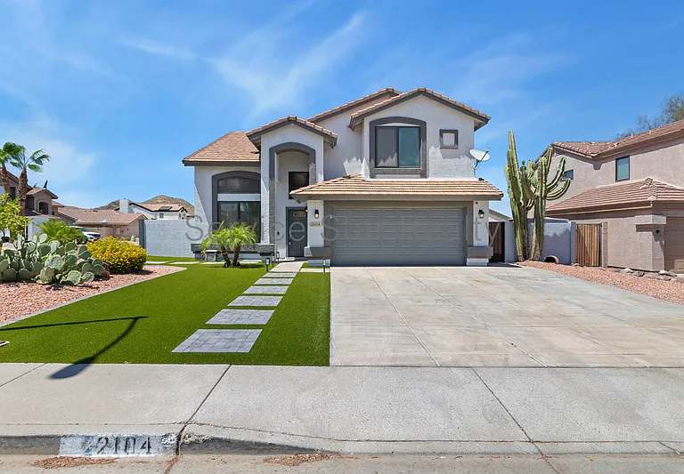 2104 E Behrend Dr — Photo 1
