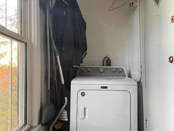 Dryer at top of stairs (washer inside apartment)