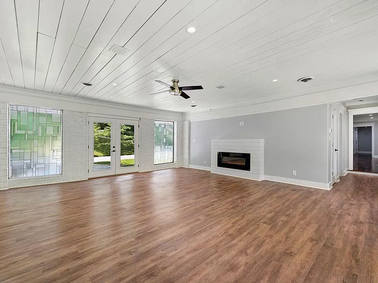 Sunroom with one of the two 52 inch electric fireplaces