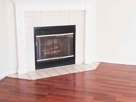 Living Room with wood burning fireplace