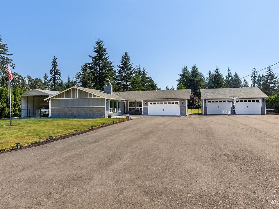Have it all - beautiful updated rambler, shop, RV parking, acreage, & tranquility!>