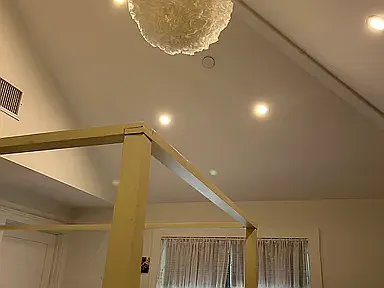 Queen Bedroom 1 with vaulted ceiling