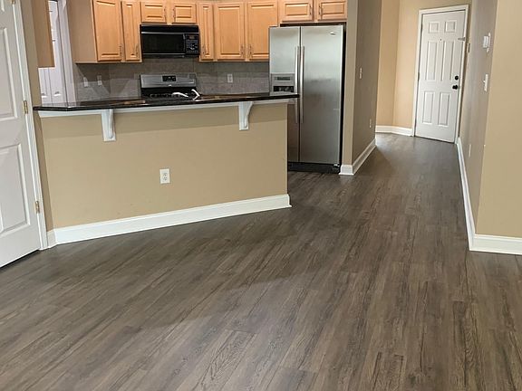 Main living area looking back at kitchen
