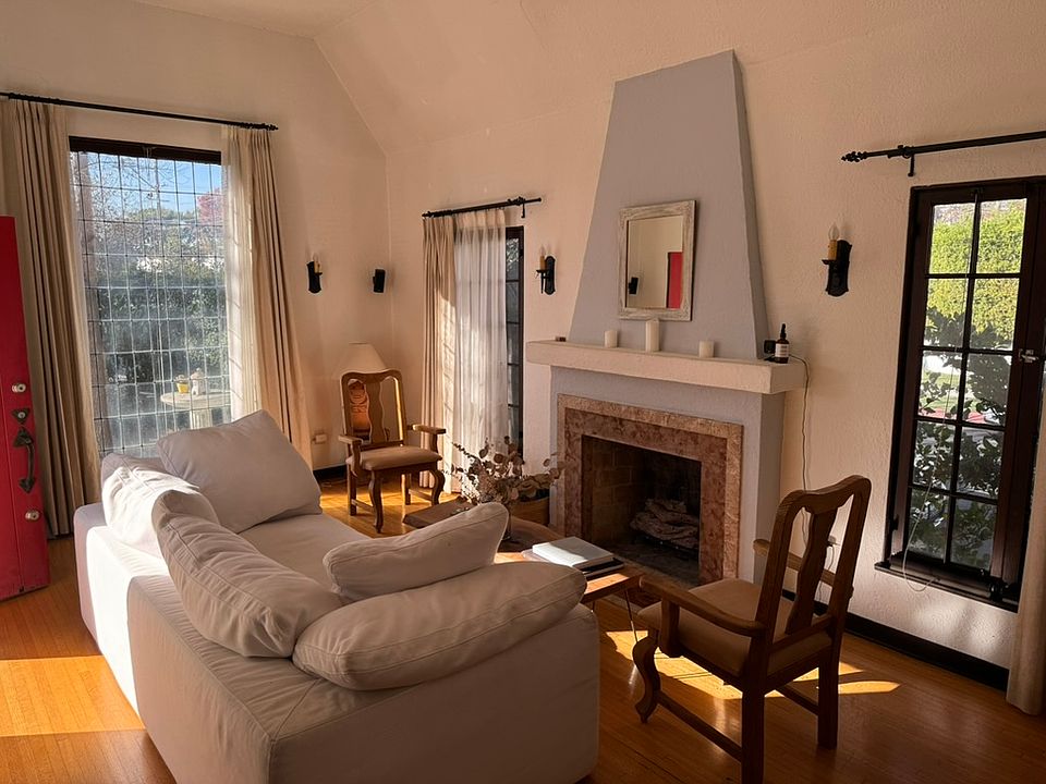 Sitting room with fireplace and built-in Bose surround sound
