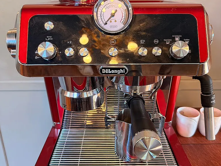 Coffee room includes a DeLonghi espresso machine.