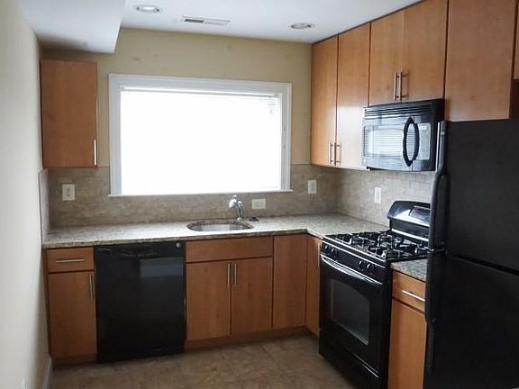 Gourmet kitchen with GE appliances