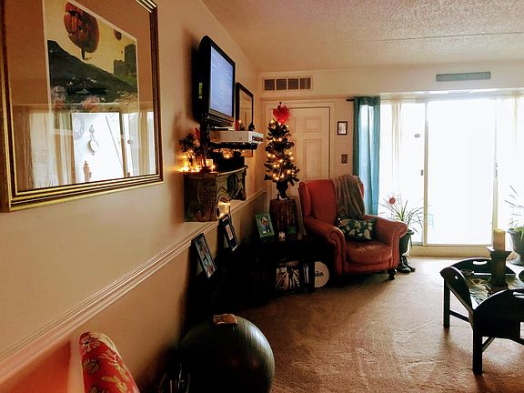 Large living room with double sliding doors to private outsi